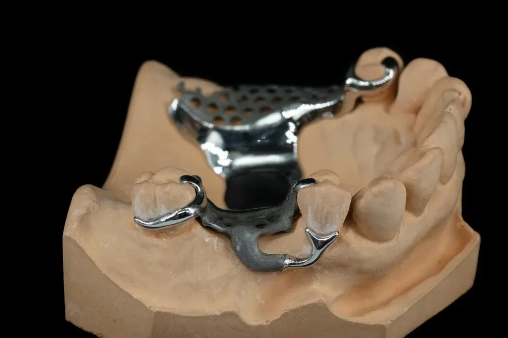 Cast cobalt-chromium partial framework seated on the master model