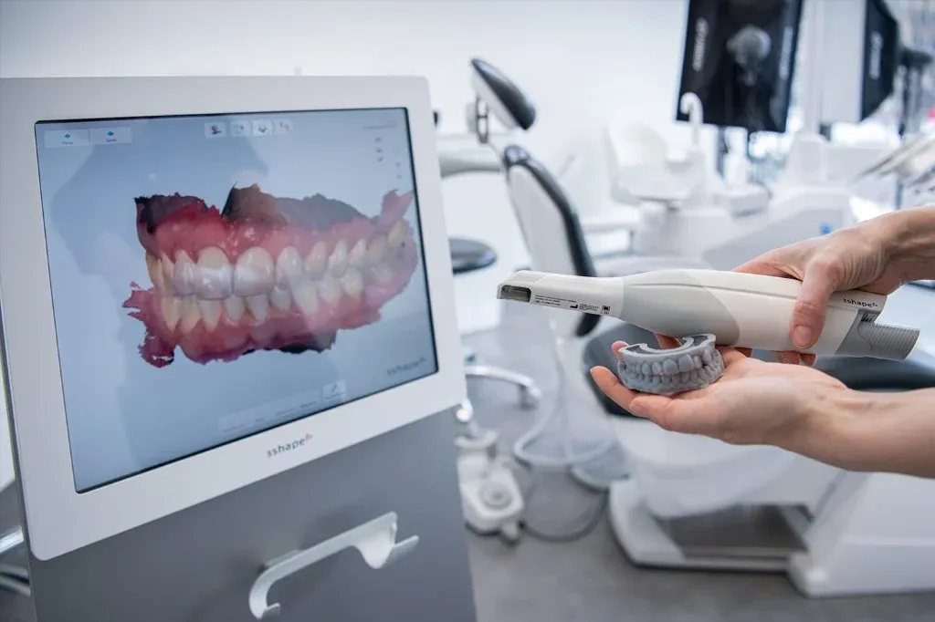 Intraoral scanner ready for high-volume digital case intake.